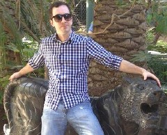 Ben in front of Lion Status at Mirage Hotel in LasVegas